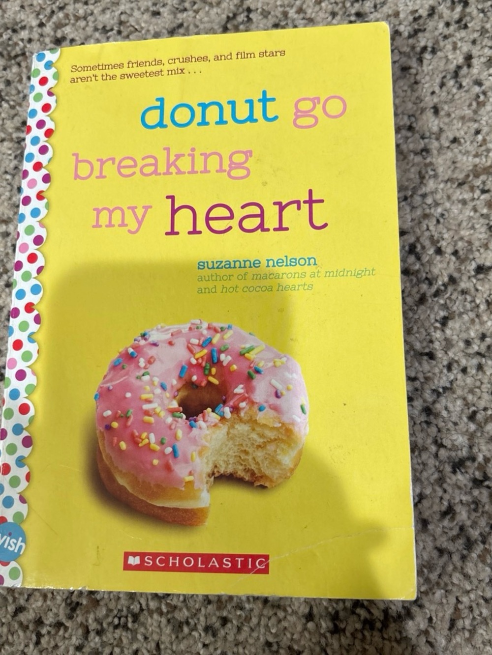 Scholastic Yellow Cover Kids Book with Pink Donut Illustration